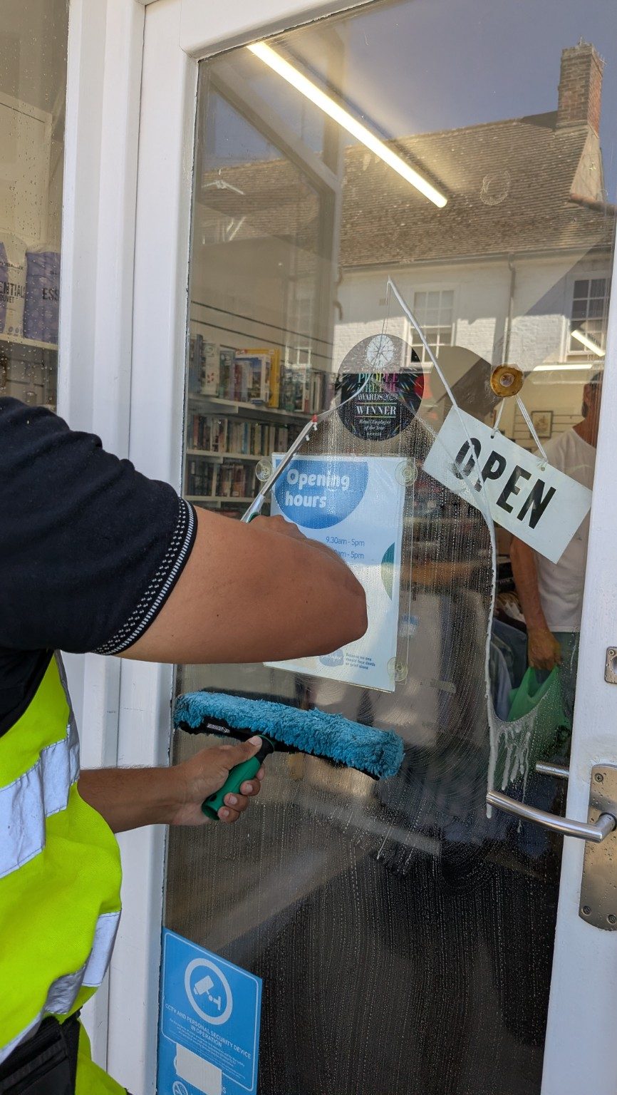 Traditional squeegee commercial window cleaning in Southwold Suffolk